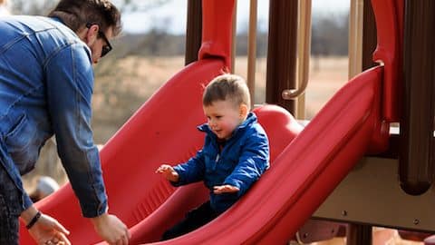 woolaroc father and son on slide woolaroc father and son on slide