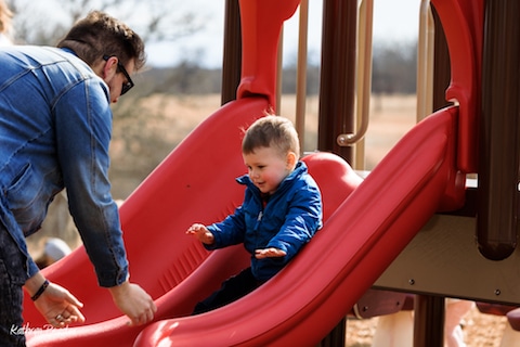woolaroc father and son on slide woolaroc father and son on slide